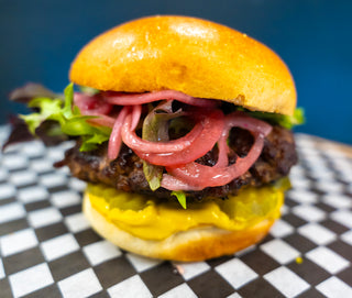 A mouthwatering picture of our beef brisket burger. The perfect convenience meal.